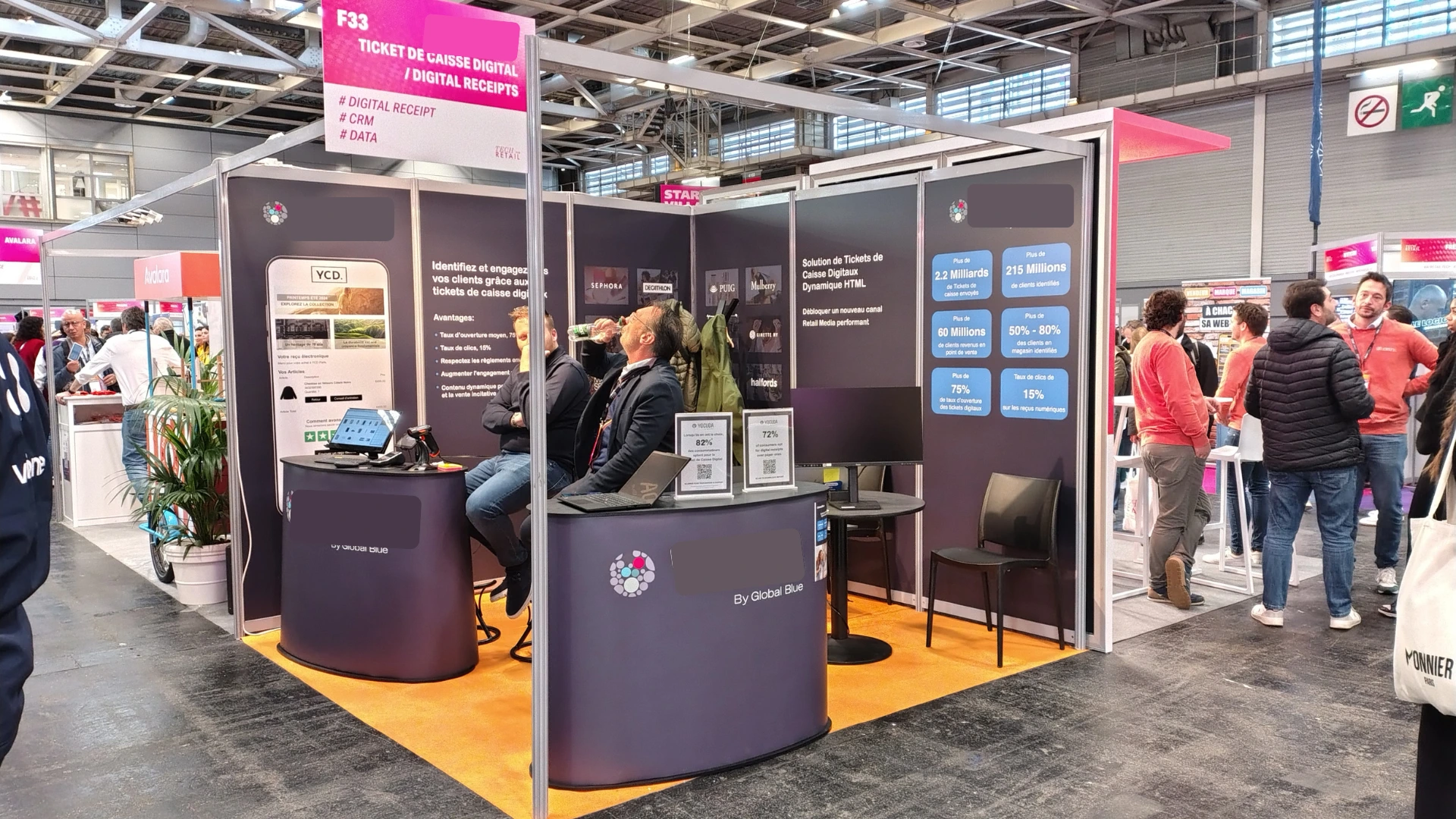 Empty trade show booth with staff waiting and no visitors stopping, illustrating why trade show marketing fails